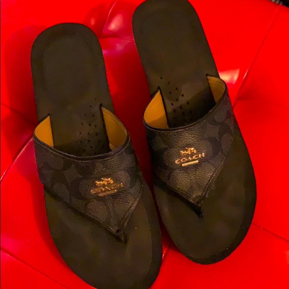 Black Coach Sandals w/ Raised Metal Coach Logo.